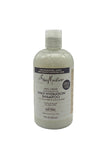 A bottle of Shea Moisture 100% Virgin Coconut Oil Daily Hydration Shampoo, 13oz, with labels and branding visible.